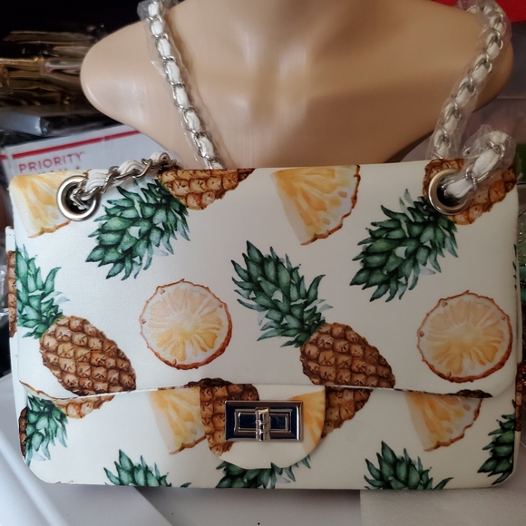 Hello 3am's pineapple clutch with so much to offe - Picture 1 of 5